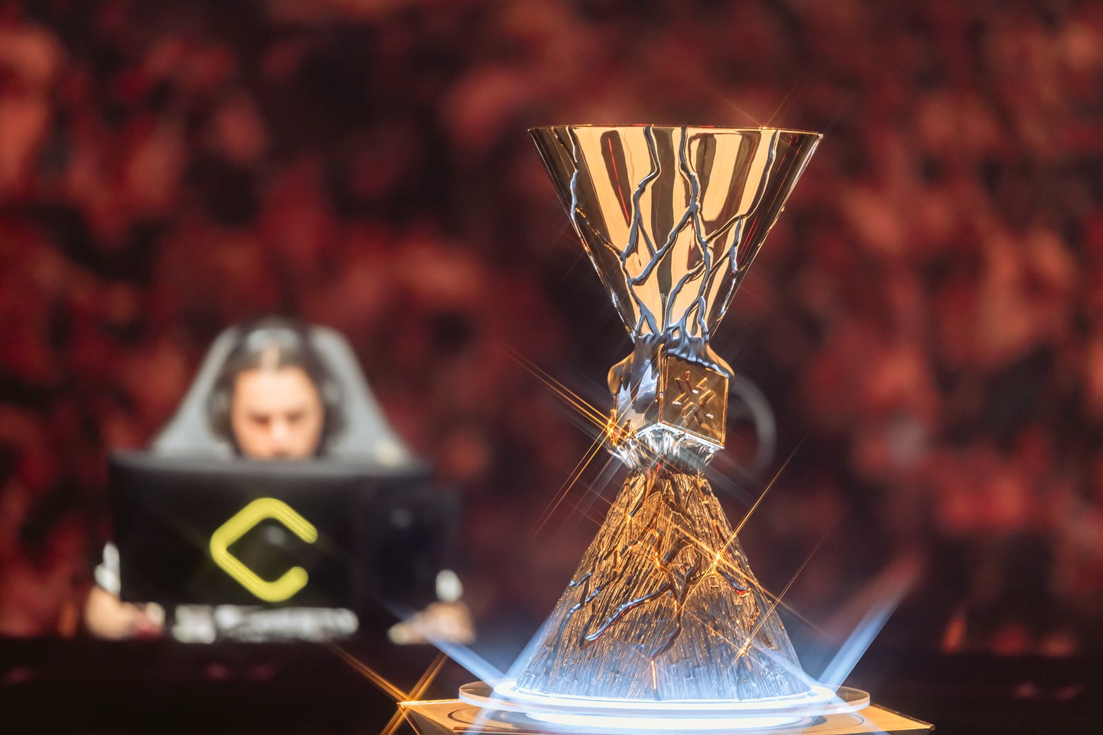 The VALORANT Champions trophy on display at the Shanghai Grand Final, with a star-filter sparkle